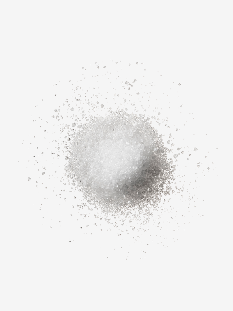 A fine white powder representing the skincare ingredient Arginine.