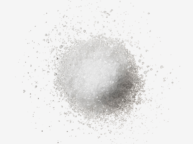 A fine white powder representing the skincare ingredient Arginine.