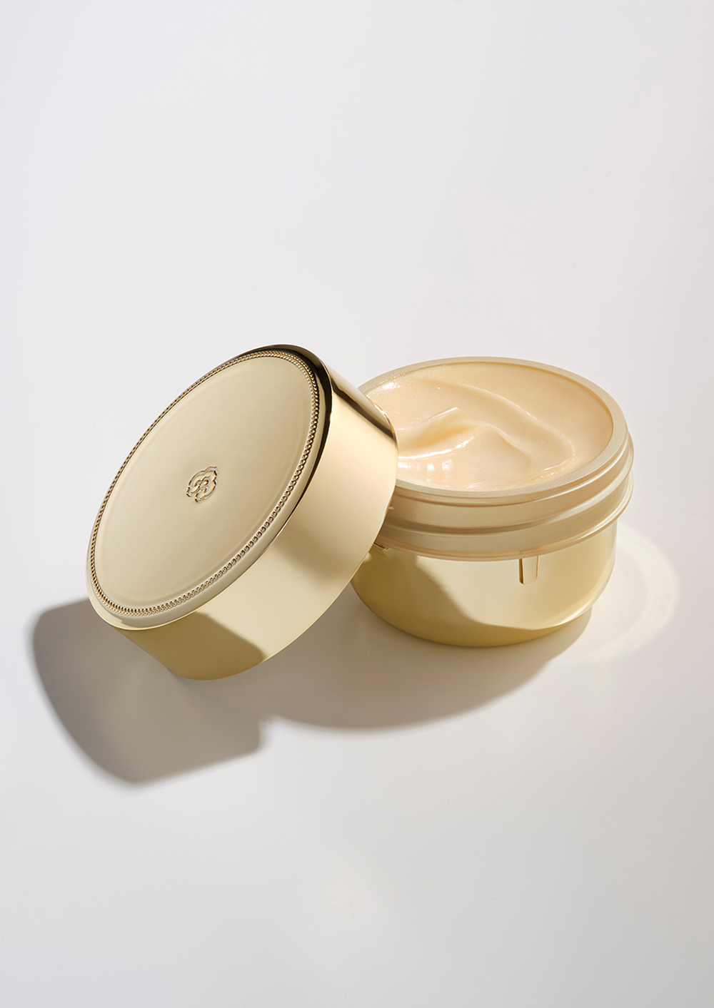 Imperial Youth Cream refill container, showing its cream texture inside.
