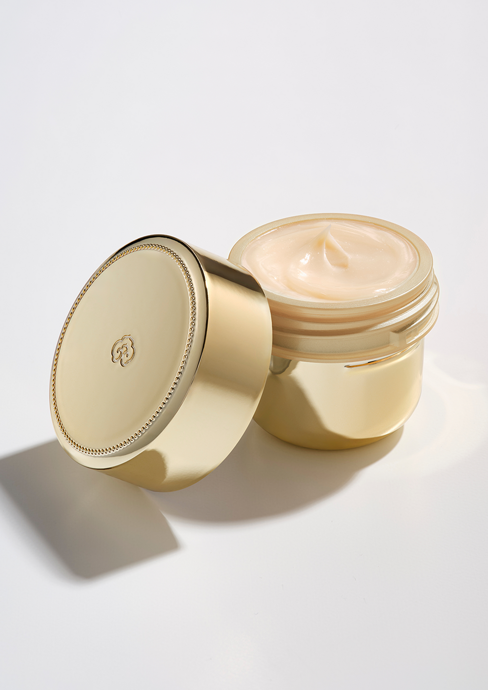 Imperial Youth Contour Eye Cream refill container, showing its cream texture inside.