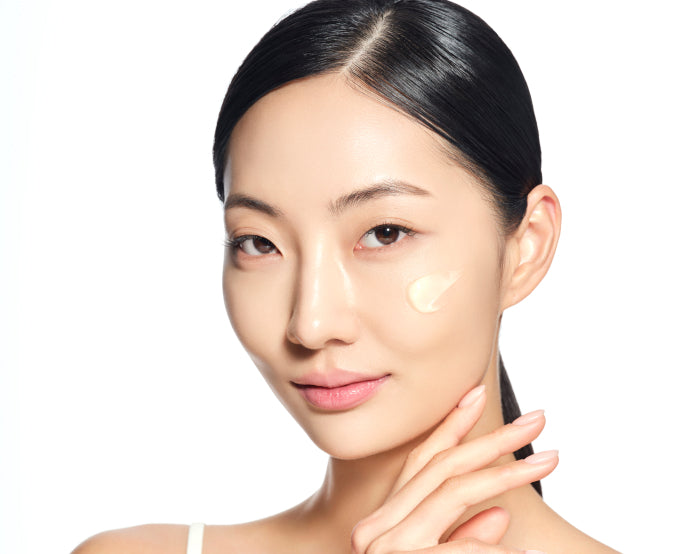 Model with Imperial Youth Cream applied to the cheek.